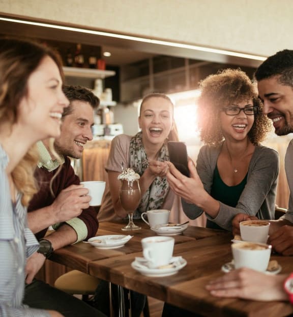 Friends enjoying coffee and conversation